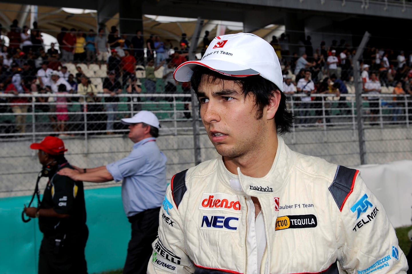 Sergio Perez (MEX) Sauber on the grid. Formula One World Championship, Rd 2, Malaysian Grand Prix,